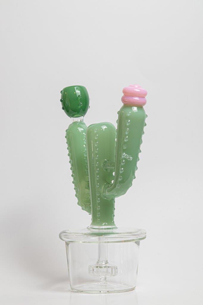 Cactus Water Pipe – an 8-inch rig designed for weed and dabs. Available for sale, this exceptional piece features a Cactus shape design, a bowl piece for weed, and a bent-down stem bubbler, offering a unique smoking experience inspired by the beauty of cacti . Dry herb only