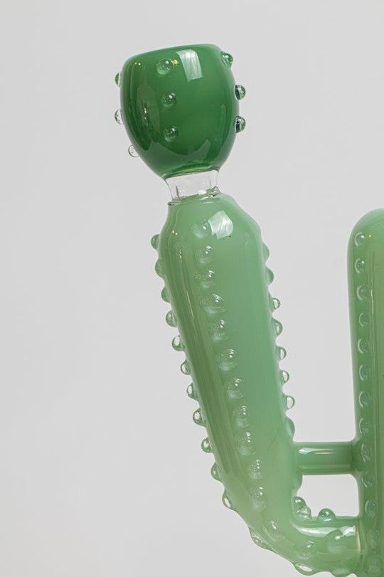 Cactus Water Pipe – an 8-inch rig designed for weed and dabs. Available for sale, this exceptional piece features a Cactus shape design, a bowl piece for weed, and a bent-down stem bubbler, offering a unique smoking experience inspired by the beauty of cacti . Dry herb only