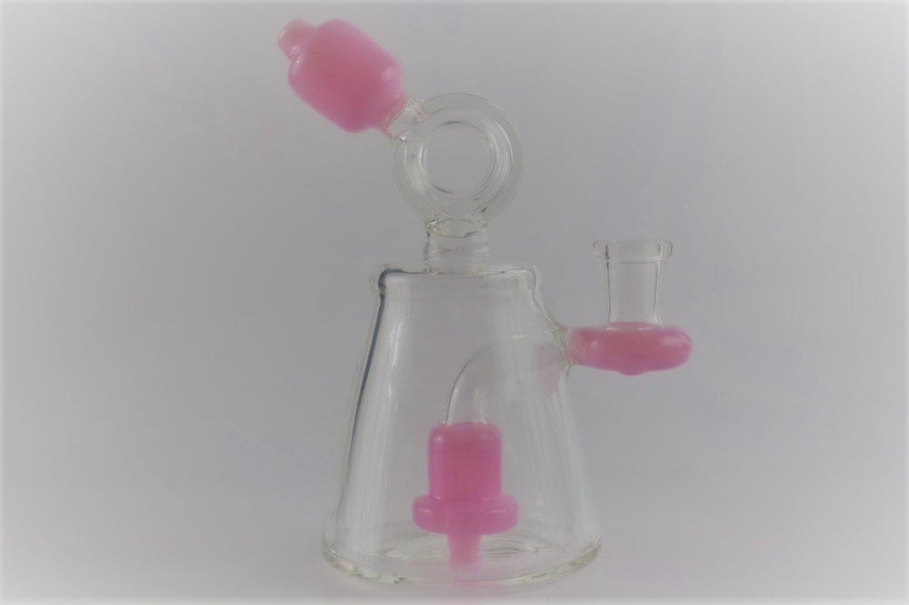 6.25-inch Purple Donut Recycler – the ultimate companion for weed and dabs in water bong style glass. Now for sale, this dope recycler features a 14MM male bowl piece for weed and a bent down stem . Color pink