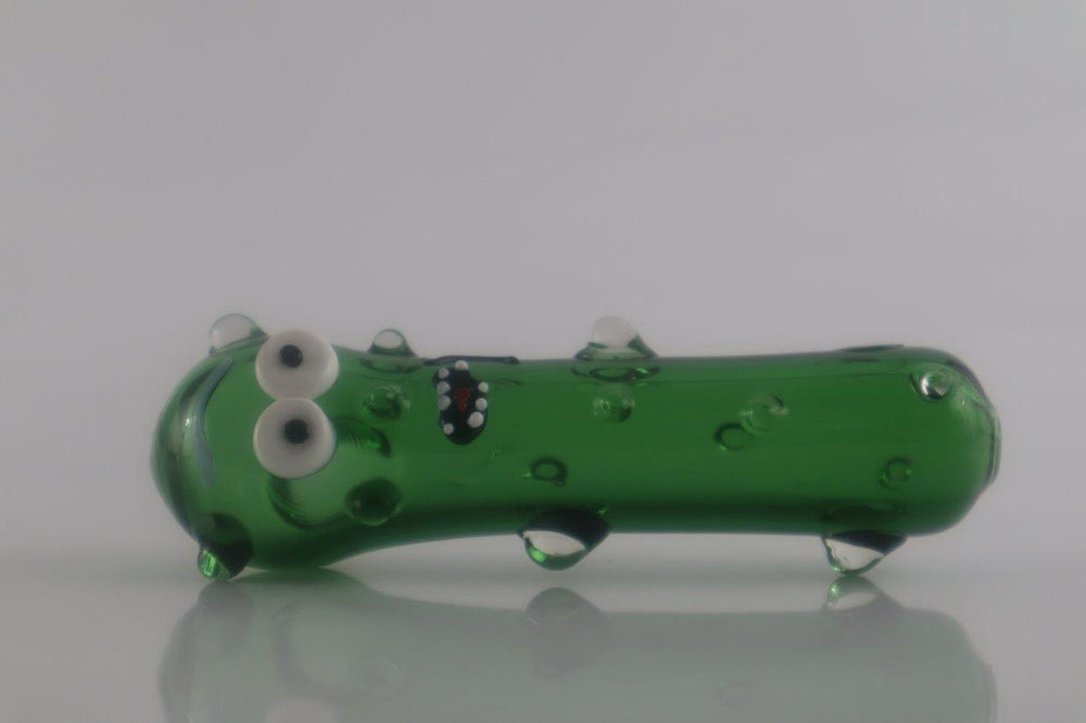 4.5-inch Pickle Rick Hand Pipe – a weed companion shaped in homage to the iconic character. With a unique spoon-style glass design , this piece is now for sale