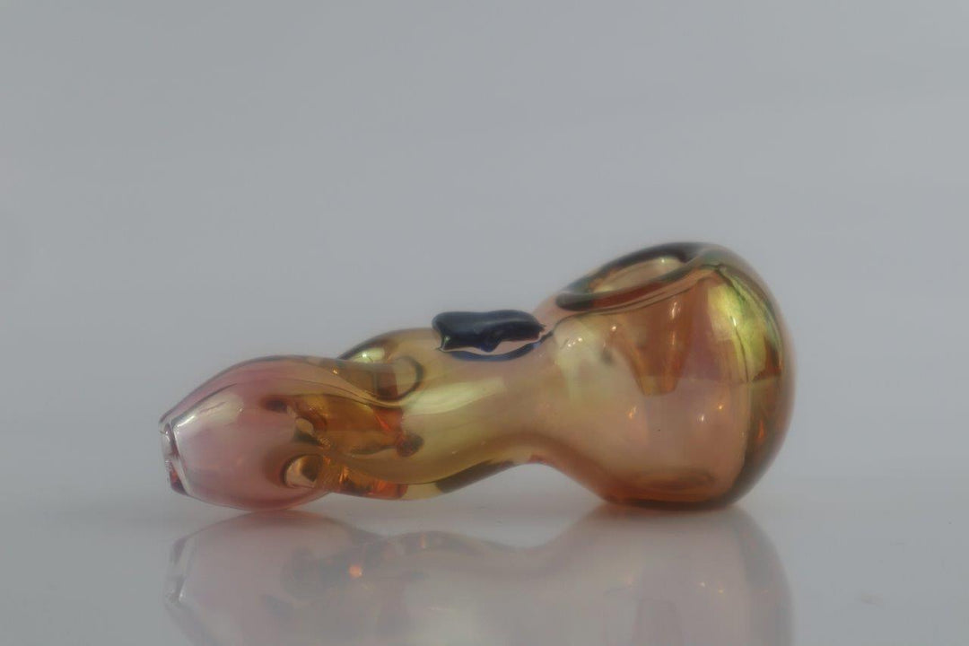 3.5-inch Amber Chrome Fluorescent Hand Pipe – a pocket-sized weed delight boasting a unique spoon-style glass design