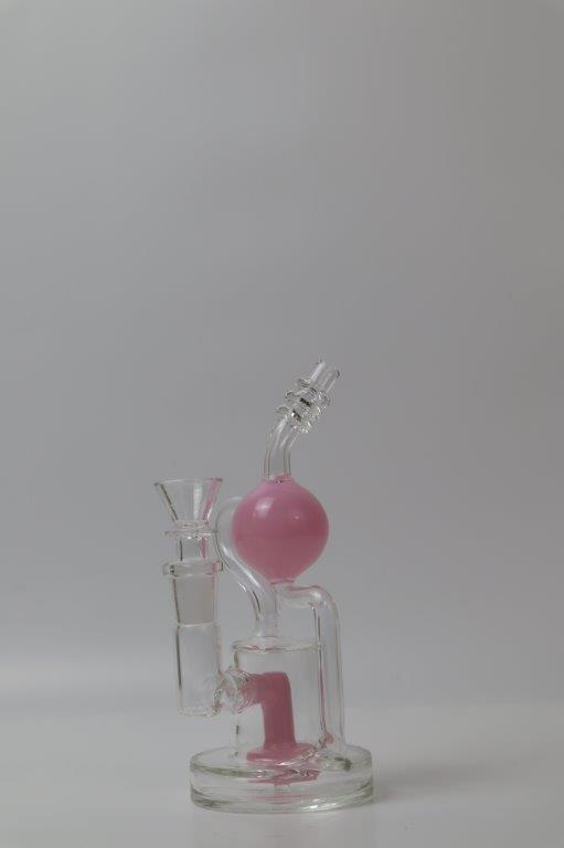 8-inch Sphere Water Pipe – a unique weed and dab companion in water bong style glass. Now for sale, this sphere-shaped beauty includes a 14MM female bowl and a tree perc bent down stem. The included percolator guarantees a smooth and rounded smoking experience, preventing water splashback and providing extra filtration for a refined hit every time . Color pink